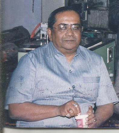 Dr. Tilak Guha